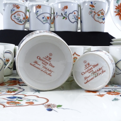 83 - A Limoges Christian Dior Imari pattern tea service, including 6 various jugs and 2 trays