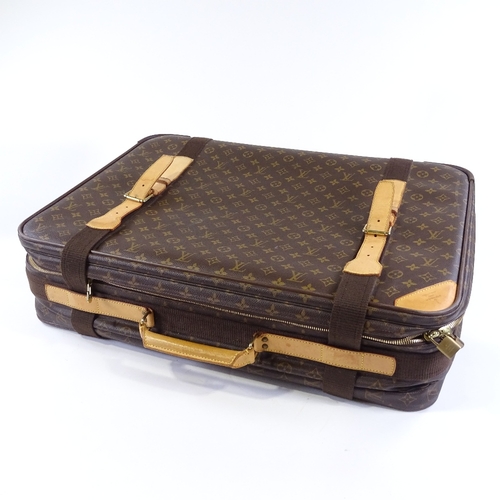 85 - A Louis Vuitton monogram pattern suitcase, 65cm x 48cm x 16cm