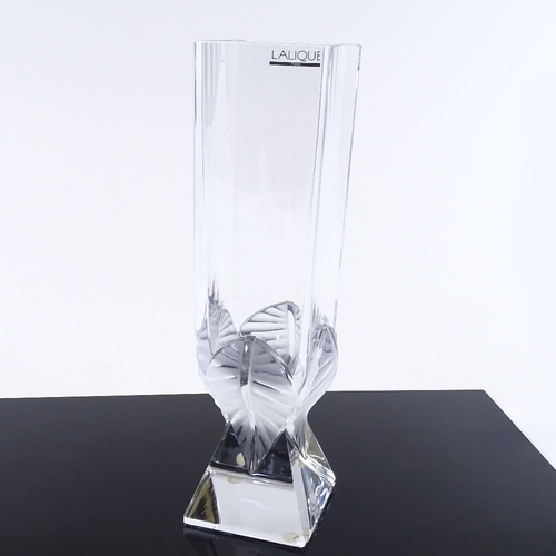 93 - A modern Lalique glass square-section vase, with relief moulded leaf decorated base, height 29cm, sm... 