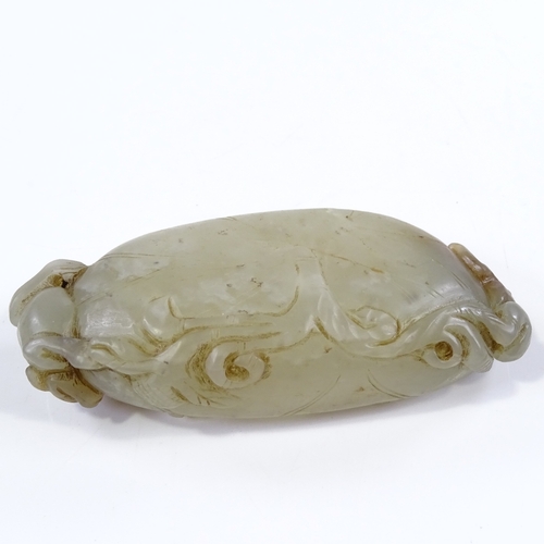 98 - A Chinese relief carved jade bowl, with animal mounts, length 11cm