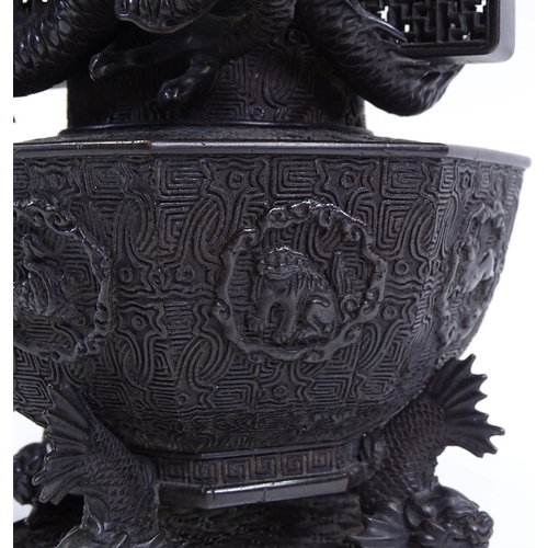 119 - A pair of Japanese Meiji period bronze vases, 3-dimensional dragon mounted necks, with pierced friez... 