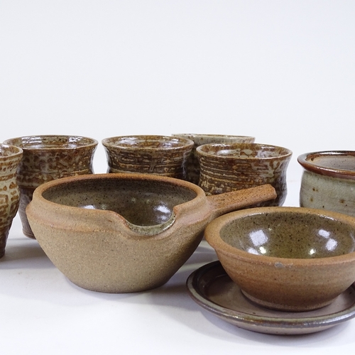 100 - Michael Leach, Yelland studio pottery, 5 beakers, height 8cm, a planter with saucer, and 2 pieces of... 