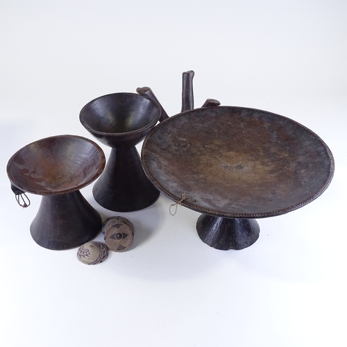 113 - A group of African wood Tribal bowls etc
Please note: this lot does not include the 4 small beadwork... 