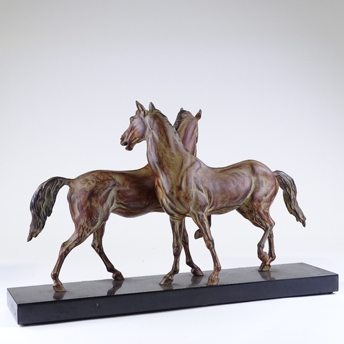 118 - An Art Deco style patinated metal sculpture of 2 horses, on 2-colour marble base, base length 70cm