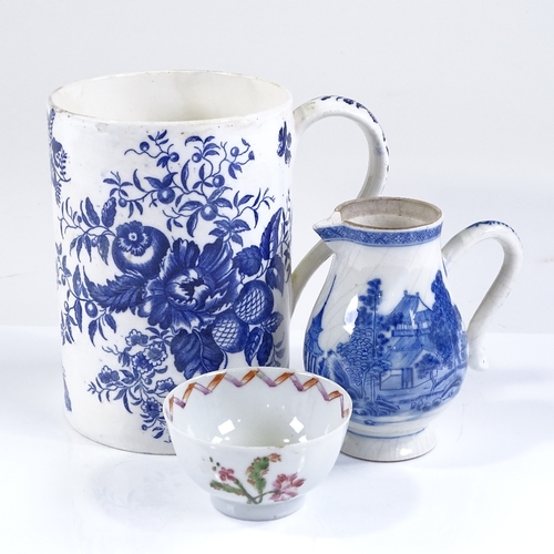 121 - A large Worcester porcelain blue and white transfer decorated mug, height 15cm, a blue and white tra... 