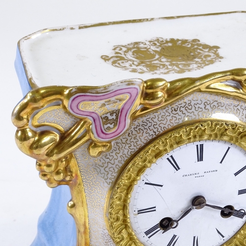 126 - An ornate 19th century French porcelain-cased mantel clock with gilded decoration, enamel dial signe... 