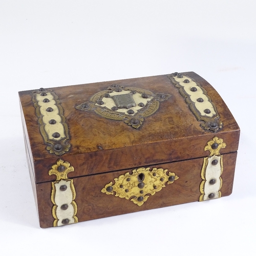 128 - A Victorian walnut dome-top jewel box, with ivory and brass mounts, and tray-fitted interior, width ... 