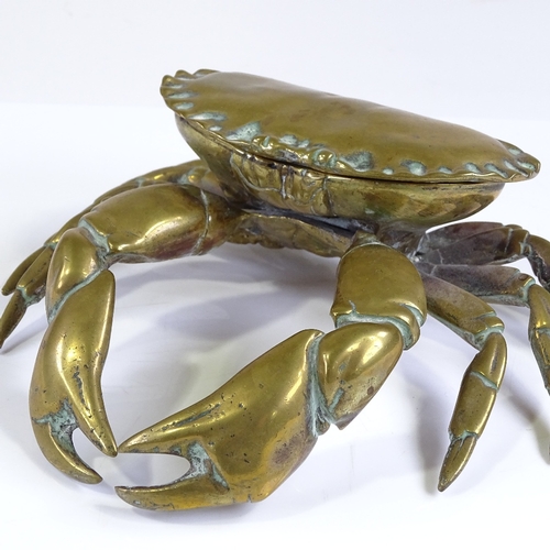 130 - A Victorian brass inkwell in the form of a crab, with rising lid and glass well, width 19cm