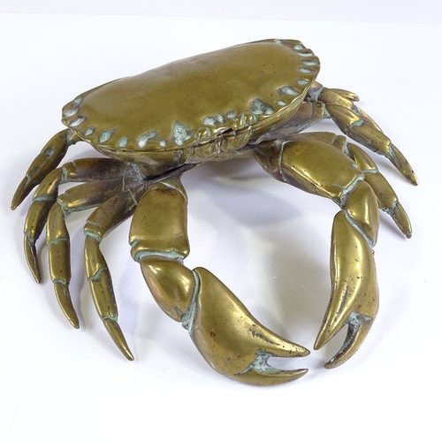 130 - A Victorian brass inkwell in the form of a crab, with rising lid and glass well, width 19cm