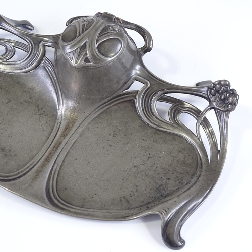 131 - A WMF Art Nouveau relief-cast pewter desk stand with inkwell, width 23cm