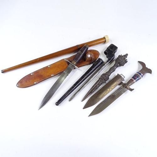 133 - A Thai bronze ceremonial dagger, an Indian brass-mounted dagger, a spike bayonet etc (5)