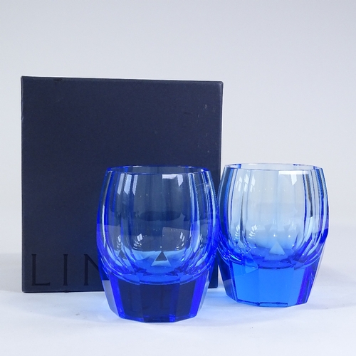 15 - A pair of David Linley facet-cut blue glass tumblers, height 11cm, boxed