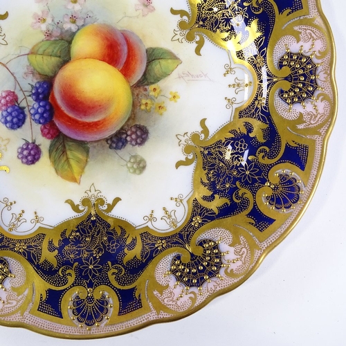 45 - A Royal Worcester porcelain cabinet plate, with hand painted fruit design in textured gilded border,... 