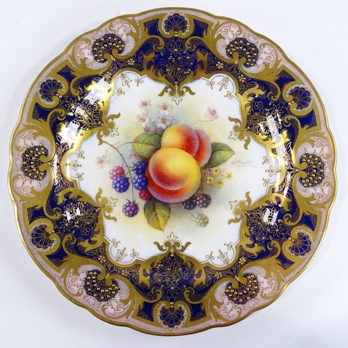 45 - A Royal Worcester porcelain cabinet plate, with hand painted fruit design in textured gilded border,... 
