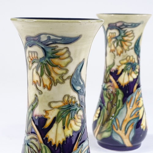 47 - A pair of Moorcroft Pottery floral decorated vases, 1999, height 21cm