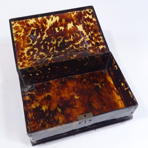 48 - A 19th century rectangular tortoiseshell jewel box, with shaped lid and unmarked silver hinges and m... 