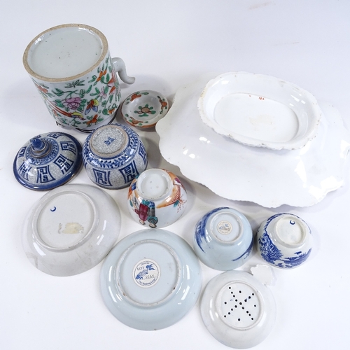 79 - A group of English and Chinese porcelain, including a transfer decorated pearlware strainer, a Worce... 