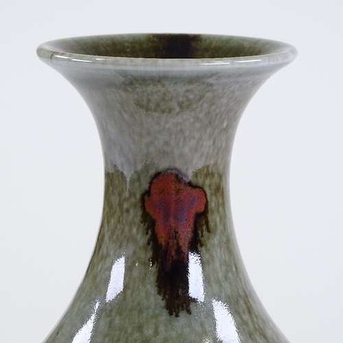 85 - Poh Chap Yeap (1927 - 2007), porcelain vase with flared rim, green speckle glaze and running iron sp... 