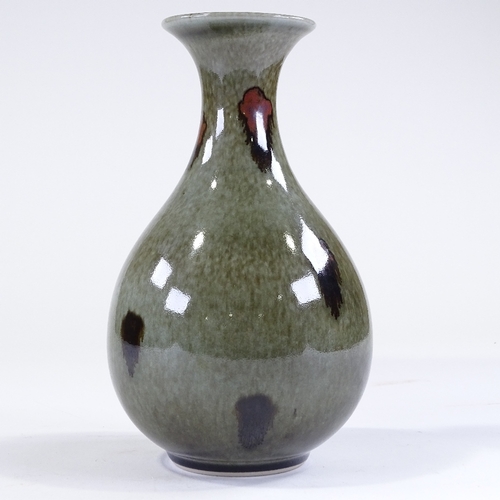 85 - Poh Chap Yeap (1927 - 2007), porcelain vase with flared rim, green speckle glaze and running iron sp... 