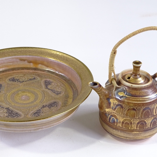 90 - Mary Rich (born 1940), gold and lustre decorated footed bowl, diameter 15cm, and a similar cane-hand... 