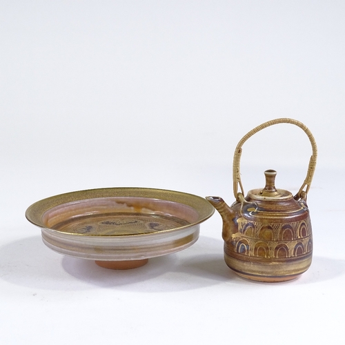 90 - Mary Rich (born 1940), gold and lustre decorated footed bowl, diameter 15cm, and a similar cane-hand... 