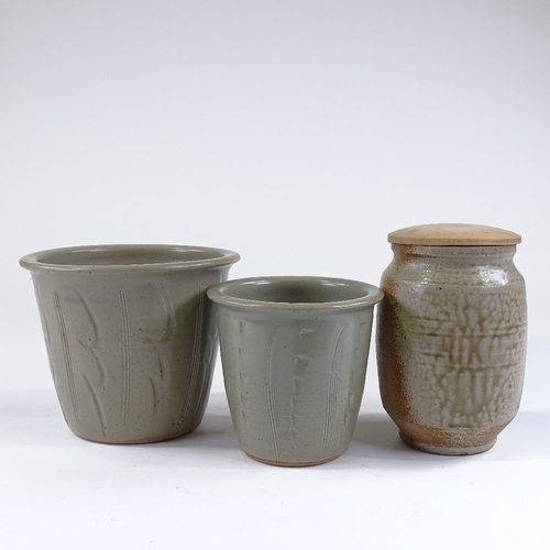 94 - Lowerdown studio pottery, (David Leach interest), 2 plant pots with green glaze incised decoration, ... 