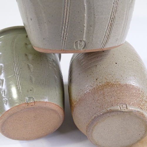 94 - Lowerdown studio pottery, (David Leach interest), 2 plant pots with green glaze incised decoration, ... 