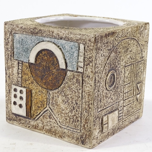 41 - A Troika Cornwall Pottery cube vase with relief decorated abstract designs, signed under base, heigh... 