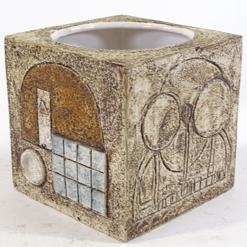 41 - A Troika Cornwall Pottery cube vase with relief decorated abstract designs, signed under base, heigh... 