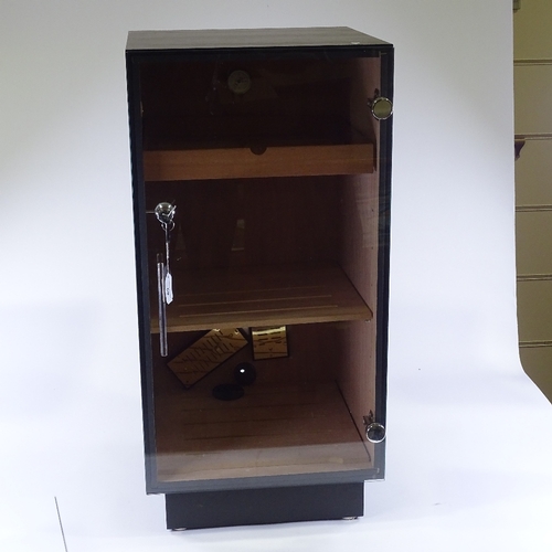 69 - A large size glass-front humidor, with multiple shelves and trays, height 80cm, width 40cm, depth 41... 