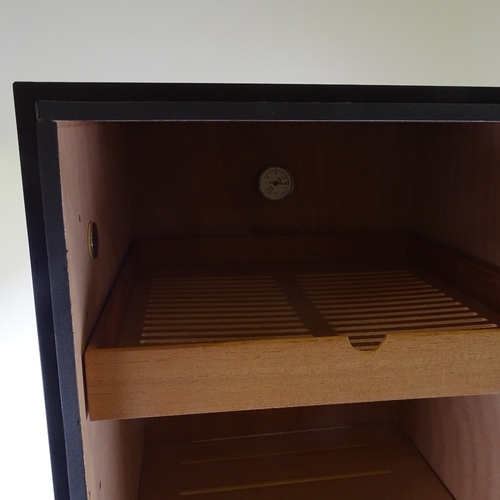 69 - A large size glass-front humidor, with multiple shelves and trays, height 80cm, width 40cm, depth 41... 