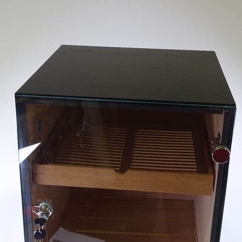 69 - A large size glass-front humidor, with multiple shelves and trays, height 80cm, width 40cm, depth 41... 