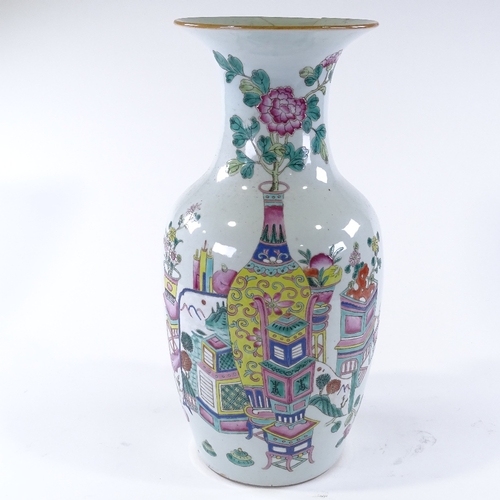 108 - A Chinese white glaze porcelain vase, with painted enamel designs, height 43cm, rim A/F