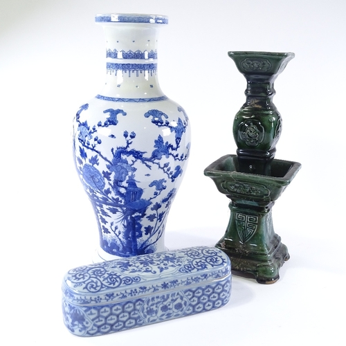 113 - A group of Chinese porcelain items, including a green glazed porcelain table centre candle stand, he... 