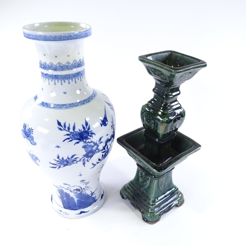 113 - A group of Chinese porcelain items, including a green glazed porcelain table centre candle stand, he... 