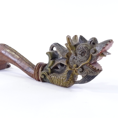 116 - A Chinese carved and painted wood ceremonial spoon with dragon design handle, length 33cm