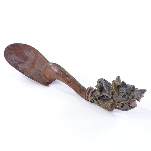 116 - A Chinese carved and painted wood ceremonial spoon with dragon design handle, length 33cm