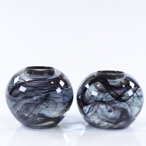 121 - Kosta Boda Sweden, pair of large ball-shaped glass candle holders, designed by Anne Ehrner, diameter... 