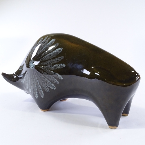 123 - A Lotus Pottery bull designed by Elizabeth Skipworth, circa 1970s, length 32.5cm