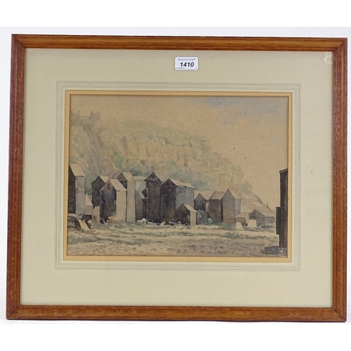 1410 - Early 20th century watercolour, the net huts at Hastings, indistinctly signed, 11