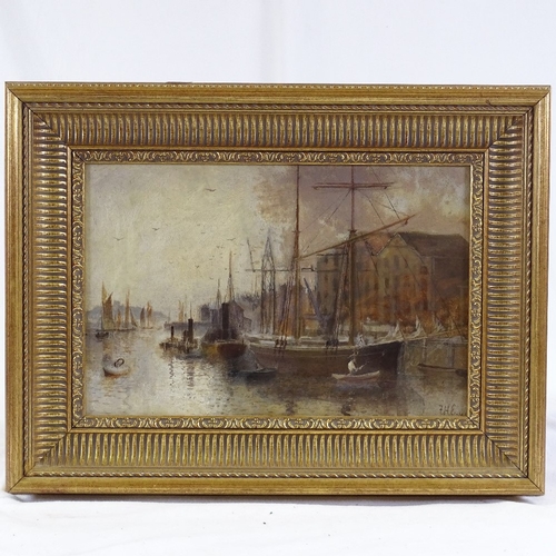 1243 - Late 19th/early 20th century oil on board, docklands scene, signed with monogram FHE, 10