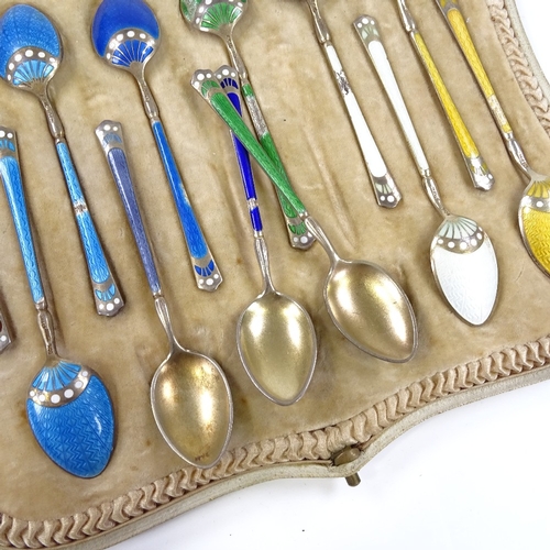 557 - A set of 12 Norwegian sterling silver-gilt harlequin enamel coffee spoons, possibly by David Anderse... 