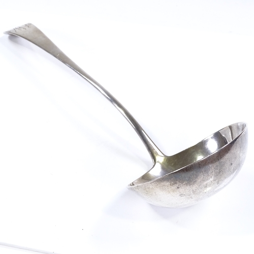 560 - A George III Old English pattern silver soup ladle, by John Lambe, hallmarks London 1781, length 32c... 