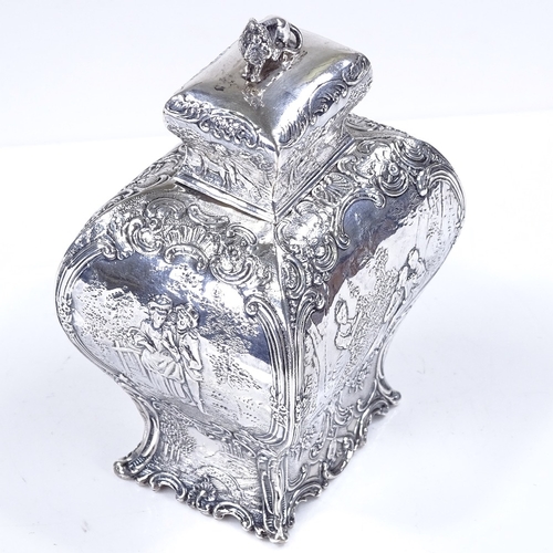 565 - A 19th century French silver tea caddy, of rectangular baluster form, with relief embossed lover sce... 