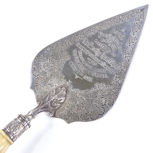 566 - A late Victorian silver and ivory-handled presentation trowel, with engraved acanthus decoration, en... 