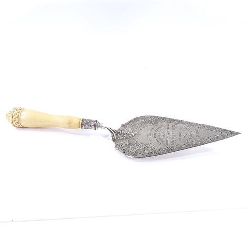 566 - A late Victorian silver and ivory-handled presentation trowel, with engraved acanthus decoration, en... 