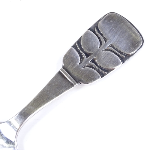 573 - A mid-century Swedish silver caddy spoon, with stylised floral handle, maker's marks MG AB, possibly... 