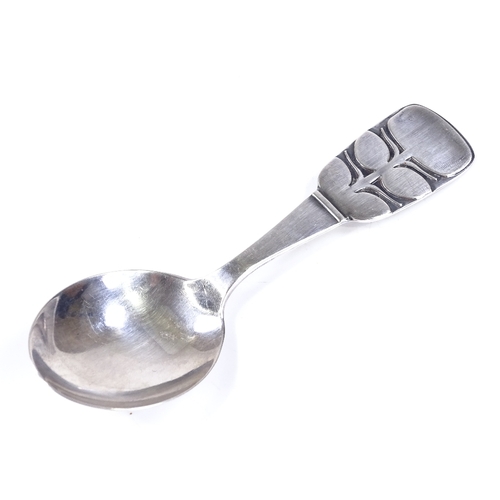 573 - A mid-century Swedish silver caddy spoon, with stylised floral handle, maker's marks MG AB, possibly... 