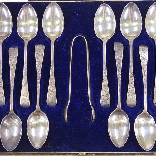 578 - A cased set of Edwardian silver teaspoons, and a pair of sugar tongs, with engraved floral handles, ... 