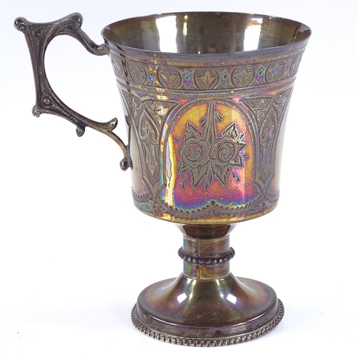 582 - A Victorian silver mug, with engraved floral decoration and cast-silver handle, with bead-edge foot,... 